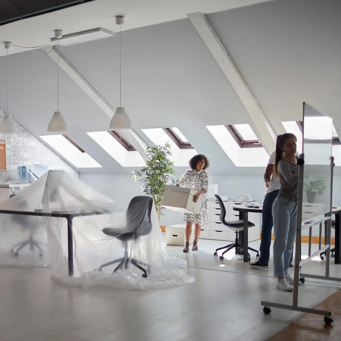 team setting up new workspace